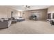 Oversized bedroom with seating area, office space, and large windows, perfect for relaxing and productivity at 12910 W Tuckey Ln, Glendale, AZ 85307