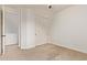 Simple bedroom with carpeted floors and closet space at 12910 W Tuckey Ln, Glendale, AZ 85307