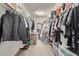 Spacious walk-in closet with shelves and ample storage space at 12910 W Tuckey Ln, Glendale, AZ 85307
