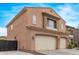 Two-story home featuring a three car garage with an extra long drive and plenty of parking at 12910 W Tuckey Ln, Glendale, AZ 85307