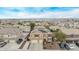 Charming two-story home with a well-manicured lawn, mature landscaping, and solar panels at 12910 W Tuckey Ln, Glendale, AZ 85307