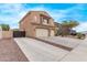 Two-story home featuring a three car garage with an extra long drive and plenty of parking at 12910 W Tuckey Ln, Glendale, AZ 85307