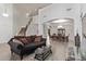 Open concept living room has soaring ceilings, with direct access to the dining room at 12910 W Tuckey Ln, Glendale, AZ 85307