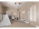 This playroom has a play tent, toy storage, and space for activities at 12910 W Tuckey Ln, Glendale, AZ 85307