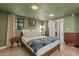 Cozy bedroom with an accent blanket and two windows providing ample natural light at 1326 E Almeria Rd, Phoenix, AZ 85006