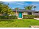 Charming single story house with a lush green lawn and a vibrant turquoise door at 1326 E Almeria Rd, Phoenix, AZ 85006