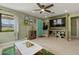 Stylish living room with entertainment center, colorful decor, and ample natural light at 1326 E Almeria Rd, Phoenix, AZ 85006
