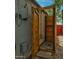 Private backyard featuring a rustic wooden outdoor shower with stone pavers at 1326 E Almeria Rd, Phoenix, AZ 85006