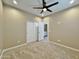 Bedroom provides carpeted floors and an ensuite bathroom with a walk-in closet at 15422 S Sequoia Cir, Arizona City, AZ 85123