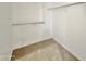 Walk-in closet features built-in shelving to maximize storage and organization at 15422 S Sequoia Cir, Arizona City, AZ 85123
