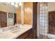 Bathroom features glass block accents and an extended vanity at 15956 E Tombstone Trl, Fountain Hills, AZ 85268