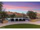 Beautiful infinity pool overlooking the desert landscape, a perfect spot for relaxation and enjoying the sunset at 15956 E Tombstone Trl, Fountain Hills, AZ 85268