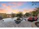 Relaxing outdoor oasis featuring a sparkling infinity pool, spa and lush desert landscaping at 15956 E Tombstone Trl, Fountain Hills, AZ 85268