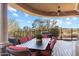Covered outdoor dining area with large table and BBQ grill at 15956 E Tombstone Trl, Fountain Hills, AZ 85268