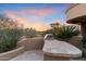 Outdoor kitchen area with built-in grill offers a perfect space for entertaining and enjoying desert views at 15956 E Tombstone Trl, Fountain Hills, AZ 85268