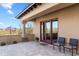 Relaxing covered patio with brick pavers, mountain views and comfortable seating at 15956 E Tombstone Trl, Fountain Hills, AZ 85268
