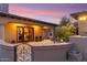 Covered patio featuring a seating area with wrought iron gate at 15956 E Tombstone Trl, Fountain Hills, AZ 85268