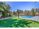 Spacious backyard with a putting green, pickleball court, and ample space for recreation and outdoor activities at 1632 S Alba Cir, Mesa, AZ 85204