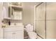 Bright bathroom featuring a shower, vanity, and toilet, designed for comfort and convenience at 1632 S Alba Cir, Mesa, AZ 85204