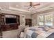 Spacious bedroom showcasing a TV console and an outdoor view of the pool at 1632 S Alba Cir, Mesa, AZ 85204