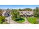 Aerial view of the home with landscaped front yard and long driveway at 1632 S Alba Cir, Mesa, AZ 85204