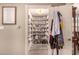 Walk-in pantry with ample shelving for organized storage at 1632 S Alba Cir, Mesa, AZ 85204