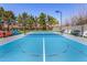 Vibrant pickleball court with seating, perfect for active recreation and social gatherings at 1632 S Alba Cir, Mesa, AZ 85204