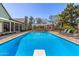 A stunning pool with a diving board and beautiful patio at 1632 S Alba Cir, Mesa, AZ 85204