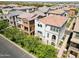 A picturesque aerial view showcases the community's architecture with its terracotta roofs and stucco exteriors at 1679 E Dogwood Ln, Gilbert, AZ 85295