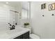 Half bathroom featuring a modern vanity, and neutral tones at 1679 E Dogwood Ln, Gilbert, AZ 85295