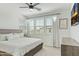 Serene main bedroom with a large bed, neutral decor, and bright windows offering natural light at 1679 E Dogwood Ln, Gilbert, AZ 85295