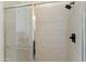 Modern shower featuring subway tile, glass enclosure, and modern hardware at 1679 E Dogwood Ln, Gilbert, AZ 85295