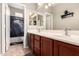 Bathroom featuring a double vanity and a shower/tub combo at 17005 S Coleman St, Phoenix, AZ 85045