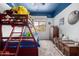 Bedroom featuring bunkbeds, carpeted floors, and a view of the mountain landscape at 17005 S Coleman St, Phoenix, AZ 85045