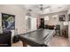 Spacious game room with a pool table and a dartboard at 17005 S Coleman St, Phoenix, AZ 85045