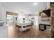 Spacious kitchen featuring a large island with seating, white cabinets, and modern appliances, ideal for entertaining at 1715 W Carol Ave, Mesa, AZ 85202