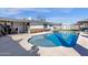 Inviting backyard pool with a spacious patio area, ideal for summer gatherings and relaxation at 1715 W Carol Ave, Mesa, AZ 85202