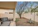 Relaxing backyard offers great space to enjoy the outdoors and features a covered patio with comfortable seating at 2167 E Aspen Dr, Tempe, AZ 85282