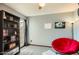 Flex bedroom is ideal for relaxing with a papasan chair and reading by the window at 2167 E Aspen Dr, Tempe, AZ 85282
