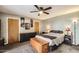 This primary bedroom features an ample closet, and neutral colors for a relaxing retreat at 2167 E Aspen Dr, Tempe, AZ 85282