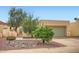 Charming home featuring desert landscaping with rocks and desert plants at 2167 E Aspen Dr, Tempe, AZ 85282