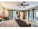 The main bedroom is spacious and features a sliding barn door to ensuite bathroom at 2167 E Aspen Dr, Tempe, AZ 85282