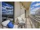 Relaxing balcony with comfortable seating and scenic views, perfect for enjoying the outdoors at 2211 E Camelback Rd # 605, Phoenix, AZ 85016