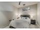Comfortable bedroom featuring a cozy bed, side tables, and ambient lighting for a relaxing retreat at 2211 E Camelback Rd # 605, Phoenix, AZ 85016