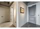 Hallway featuring hardwood floors, neutral walls, and tasteful decor, creating an inviting entrance at 2211 E Camelback Rd # 605, Phoenix, AZ 85016