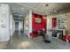 Hallway with views to the dining table and seating area at 2211 E Camelback Rd # 605, Phoenix, AZ 85016