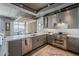 Contemporary kitchen with a central island, stainless appliances, and ample counter space at 2211 E Camelback Rd # 605, Phoenix, AZ 85016