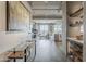 Bright living space with a glass table, fireplace, and large windows showcasing city views at 2211 E Camelback Rd # 605, Phoenix, AZ 85016