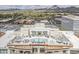 Aerial shot of a stunning rooftop pool deck with mountain views and upscale lounge seating at 2211 E Camelback Rd # 605, Phoenix, AZ 85016