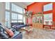 Inviting living room featuring high ceilings, a cozy seating area, and abundant natural light at 22521 N 60Th Ave, Glendale, AZ 85310